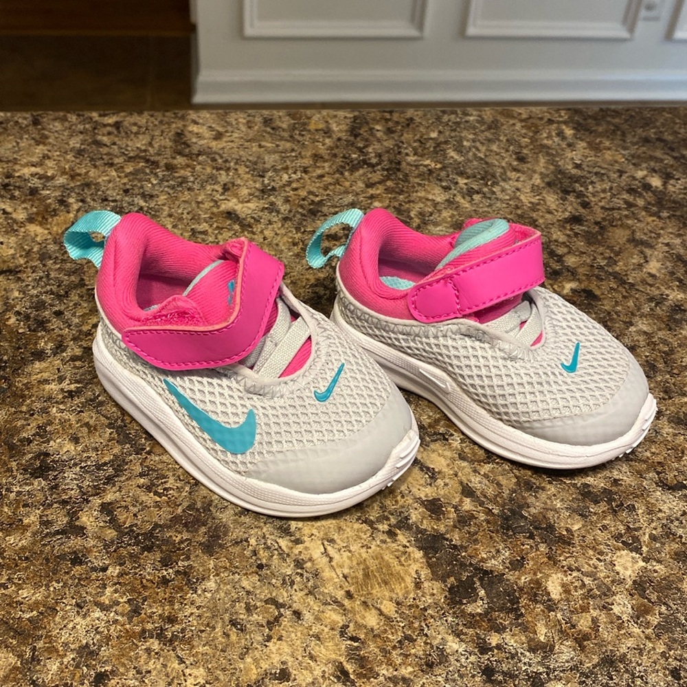 Infant shoes size 2c. Baby girl nike. Never worn, like new condition! Adorable